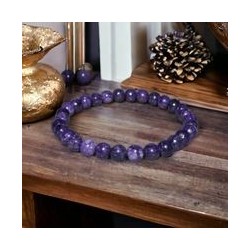 Bracelet en pierres naturelles d'Améthyste 6mm pour l'apaisement et le sommeil.