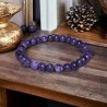 Bracelet en pierres naturelles d'Améthyste 6mm pour l'apaisement et le sommeil.